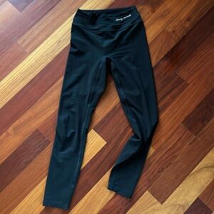 Whitney Simmons gym shark black leggings